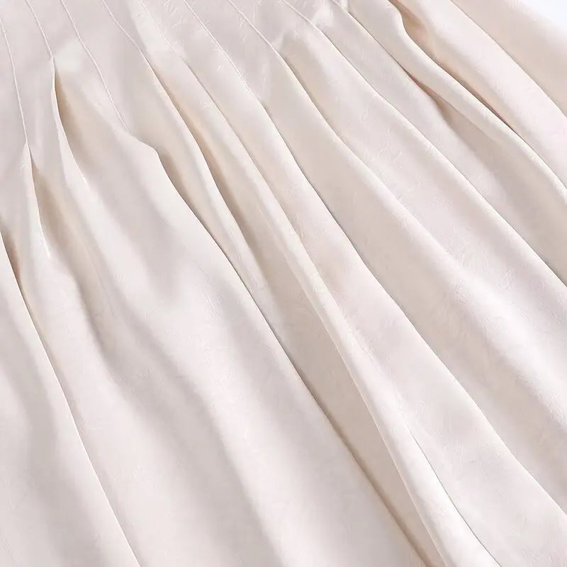UNIZERA women's skirt is fashionable casual slimming solid color pleated temperament and a new spring style skirt