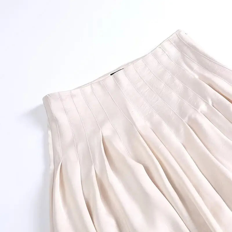 UNIZERA women's skirt is fashionable casual slimming solid color pleated temperament and a new spring style skirt